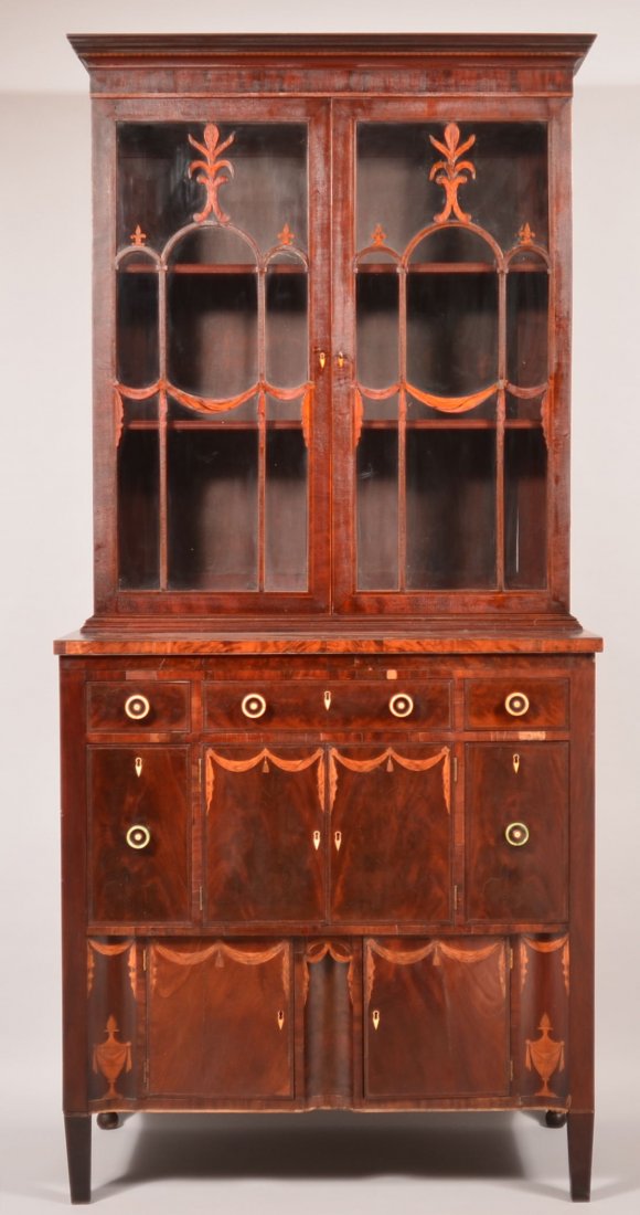 Baltimore, MD Federal Mahogany Inlaid Secretary and: Baltimore, MD Federal Mahogany Inlaid Secretary and Bookcase. Molded cornice with checkered inlays, two glazed doors with fleur de lis and drape mullions. Base with Drape, tassel and urn inlays, drawe