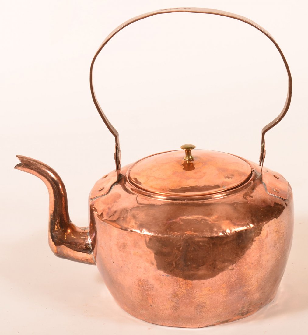 Pennsylvania Copper Tea Kettle Stamped J. Kidd. (John: Pennsylvania Copper Tea Kettle Stamped J. Kidd. (John Kidd, coppersmith, working 1796-1800, Reading, Pennsylvania), strap handle stamped "J. Kidd", goose neck spout, brass mushroom finial, 12-1/4"h. C