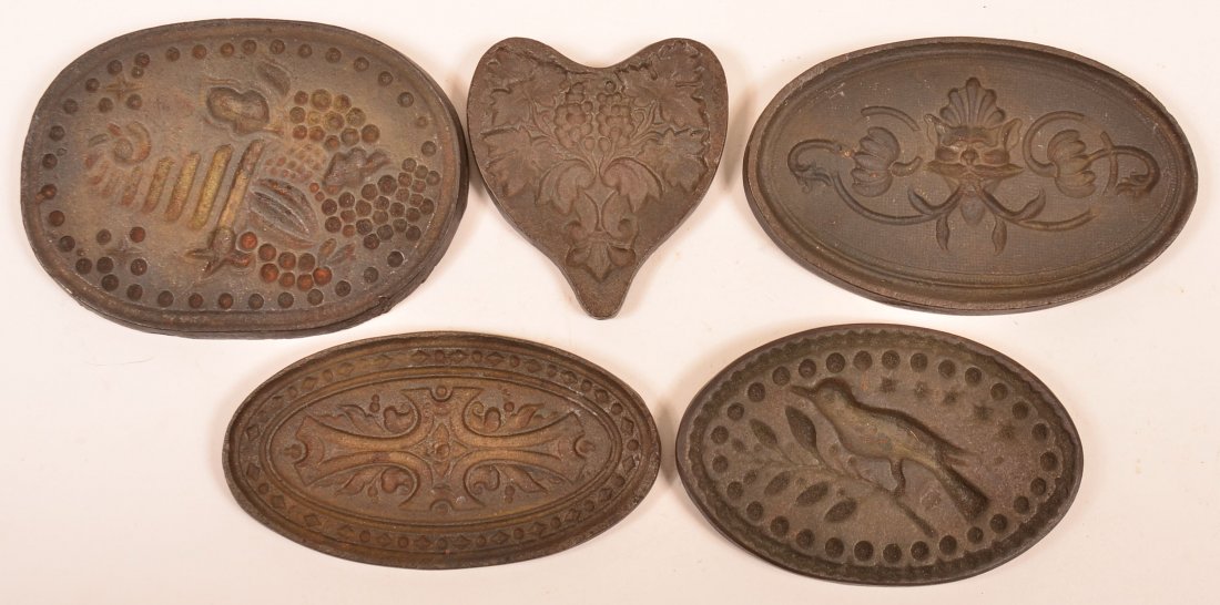 Five Cast Iron Cookie Molds. Including Floral,: Five Cast Iron Cookie Molds. Including Floral, Cornucopia with fruit, Bird on branch and grape with foliage, all with attached modern hanging hook. 3"h.-4-1/4"h. Condition: Good.