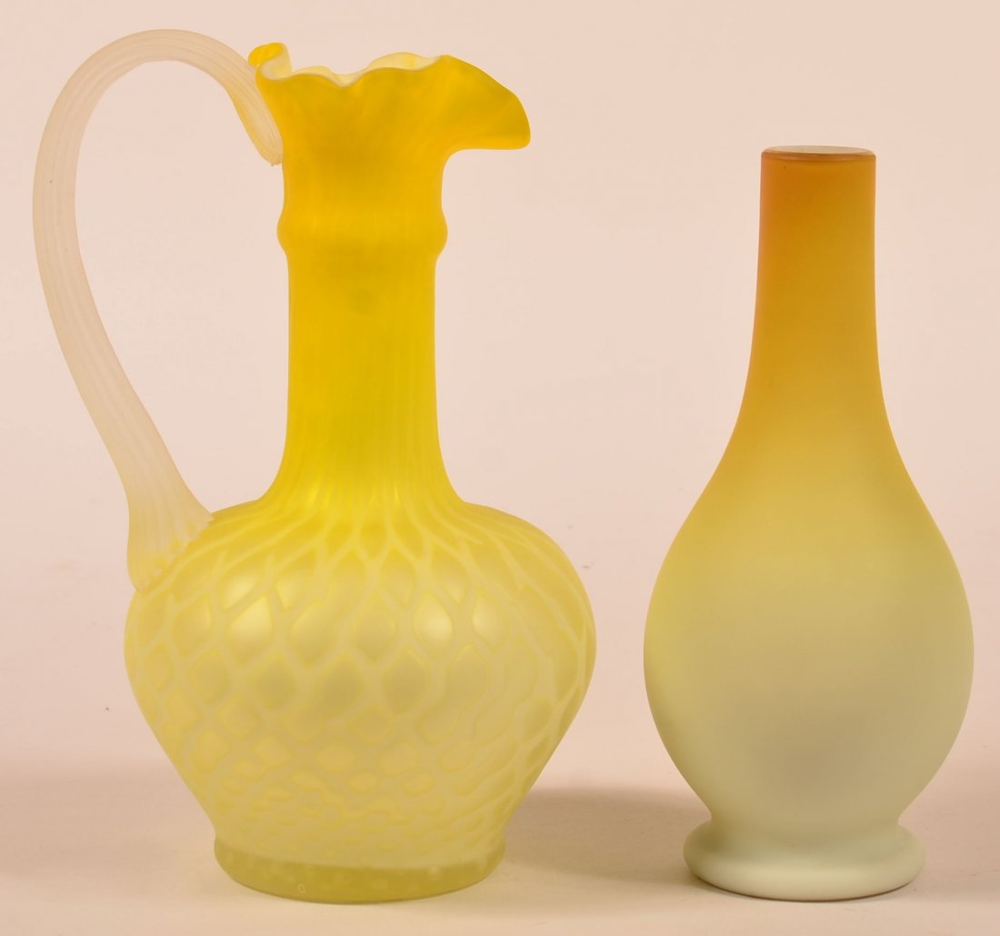Two Pieces of Satin Finish Yellow Overlay Blown Art: Two Pieces of Satin Finish Yellow Overlay Blown Art Glass. 1st: Bulbous vase, 8-1/2"h. 2nd: Ewer with applied frosted rib handle, 10"h. Condition: Very good.