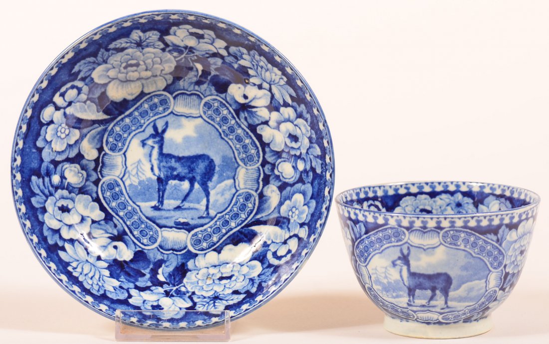 Staffordshire China Blue Transfer Doe Pattern: Staffordshire China Blue Transfer Doe Pattern Handleless Cup and Saucer. Saucer measures 5-5/8" diam. Condition: Good with one tiny chip on base rim of saucer.
