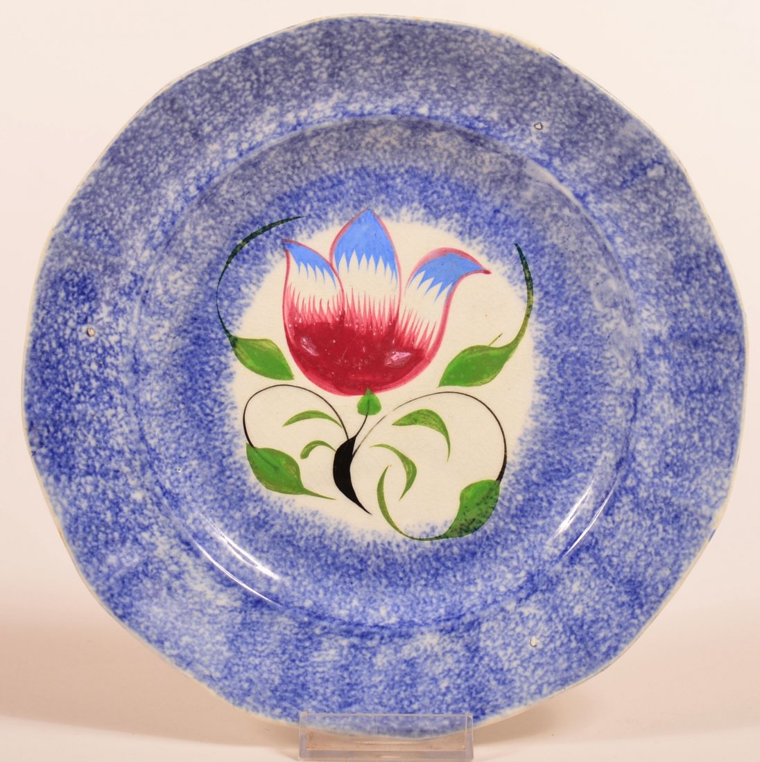 Blue Spatter Ironstone China Tulip Pattern 8-3/8": Blue Spatter Ironstone China Tulip Pattern 8-3/8" Paneled Plate. Blue and red tulip with green leaves. Condition: Very good.