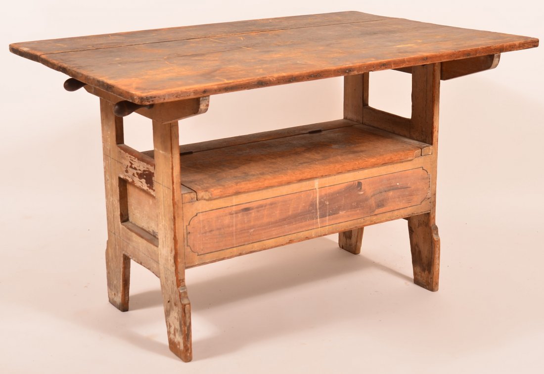 Pennsylvania Grain Painted Softwood Bench Table.: Pennsylvania Grain Painted Softwood Bench Table. Rectangular pin-top, hinged lift-lid seat compartment, paneled sides and shaped cut-out feet. 30"h. x 48"w. x 33-1/2"d. Condition: Good with surface we