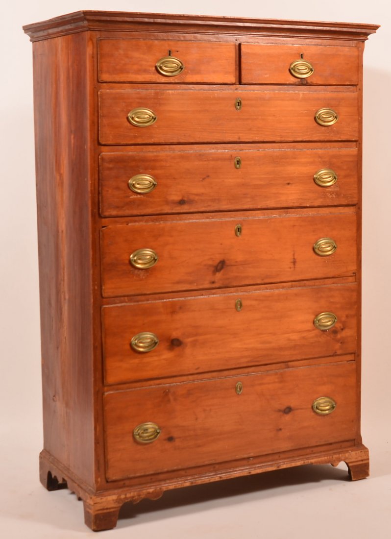 Chippendale/Hepplewhite Transitional Softwood Tall: Chippendale/Hepplewhite Transitional Softwood Tall Chest. Molded cornice, two over five full width lip molded graduated dovetailed drawers, with oval brasses, Chamfered corners, molded bracket base. 5