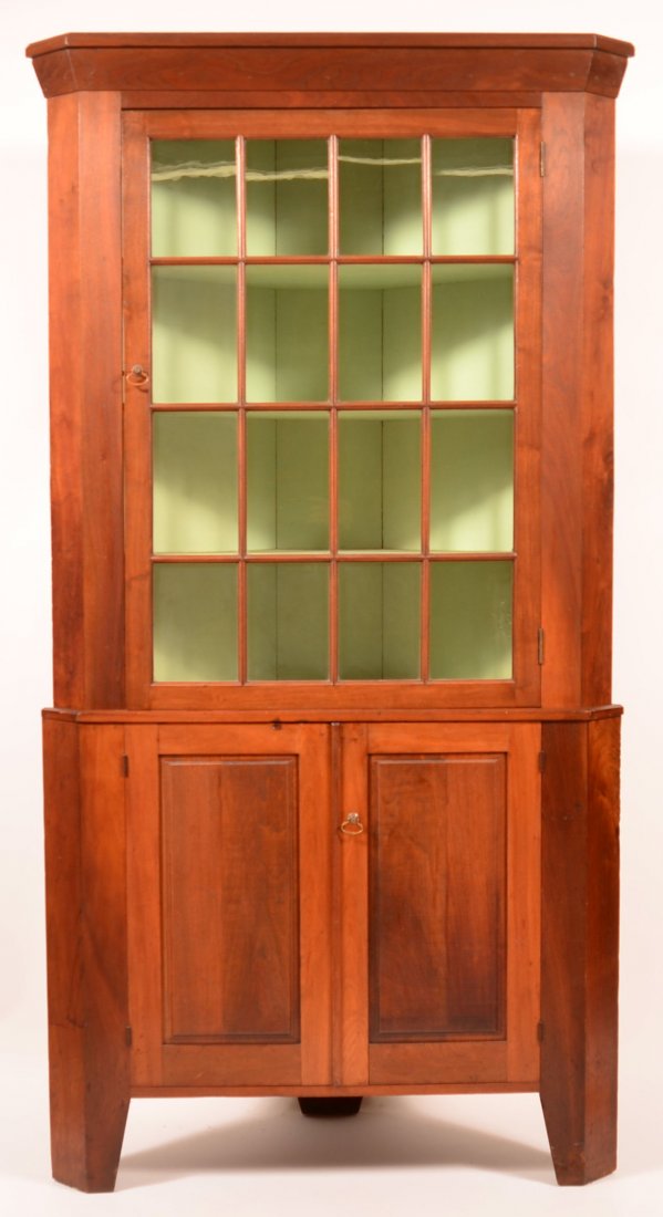 Pennsylvania Country Federal Walnut Two Part Corner: Pennsylvania Country Federal Walnut Two Part Corner Cupboard. Molded cornice, single 16 pane glazed upper door above two raised paneled lower doors and high cut out feet. 85"h. x 45"w. x 20"d. Conditi