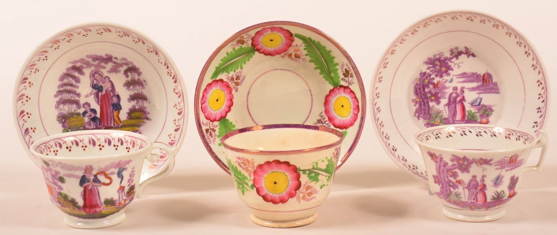 Three Lustre Decorated China Cups and Saucers. One: Three Lustre Decorated China Cups and Saucers. One floral design and two figural design. Saucers measure 5-5/8". Condition: Very good.