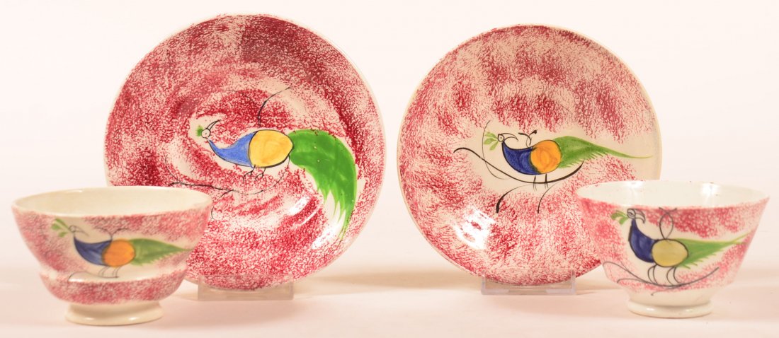 Two Red Spatter Peafowl Pattern Handleless Cups and: Two Red Spatter Peafowl Pattern Handleless Cups and Saucers. Blue, yellow and green peafowl on branch, Saucers measure 5-12" and 6" diam. Condition: Good.