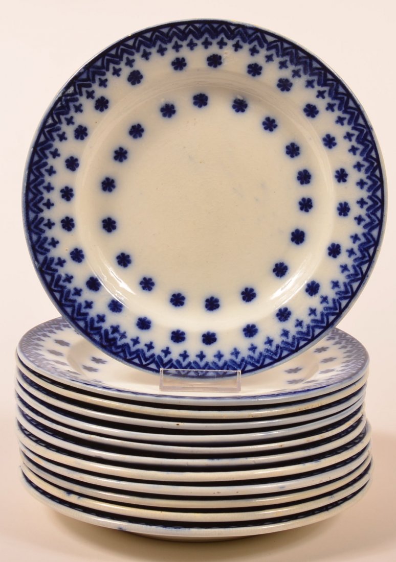 Twelve Flow Blue Snowflake Pattern Ironstone China: Twelve Flow Blue Snowflake Pattern Ironstone China 8-3/4" diam. Plates. Condition: Very good.