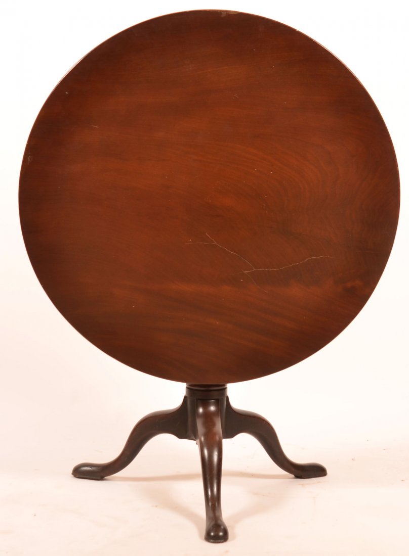 Queen Anne Mahogany Tilt Top Pedestal Base Tea Table.: Queen Anne Mahogany Tilt Top Pedestal Base Tea Table. Bird cage support turned pedestal and cabriole legs. 26-1/2"h. x 36" diam. Condition: Old refinish, some cracking to top, normal wear.