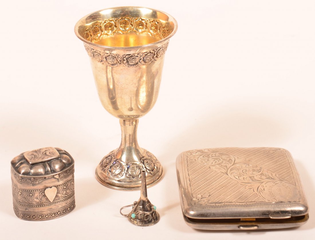 Four Pieces of European Sterling and Coin Silver.: Four Pieces of European Sterling and Coin Silver. Including a wine, pill box, cigarette case and miniature funnel set with turquoise. 5.50 troy ozs. Wine measures 4-1/4"h. Condition: Good, minor dents