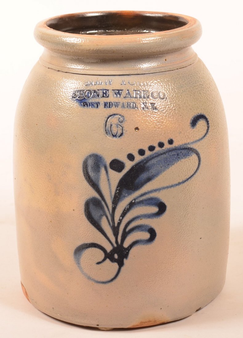 New York Stoneware Co. Fort Edward, N.Y. Six Quart: New York Stoneware Co. Fort Edward, N.Y. Six Quart Ovoid Form Storage Jar with Blue Slip Decoration. Cobalt blue floral and sprig decoration on rounded shoulders with molded rim. 10-1/2"h. Condition: