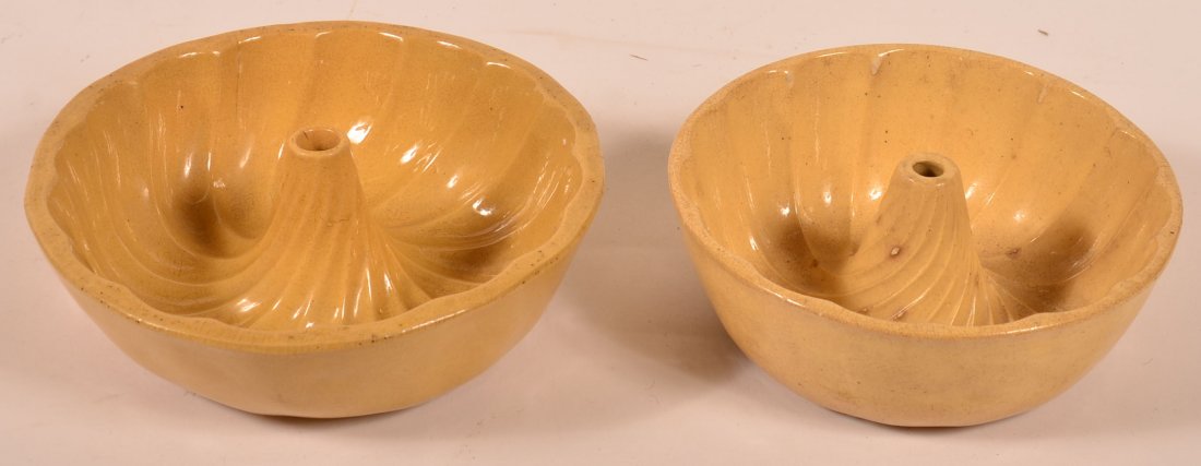 Pair of 19th C. Yelloware swirl turks head molds 8 1/2: Pair of 19th C. Yelloware swirl turks head molds 8 1/2 x 7 1/2" each. Condition: Largest fine, Smaller tight hairline