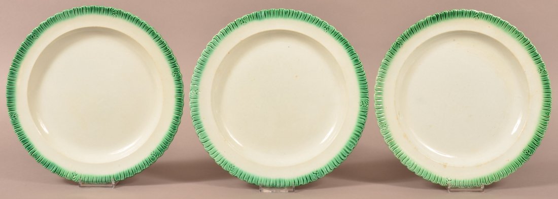 Three Leeds Soft Paste Green Feather Edge Plates.: Three Leeds Soft Paste China Green Feather Edge Plates. 10-1/4" diam. Condition: Very good, minor stains.