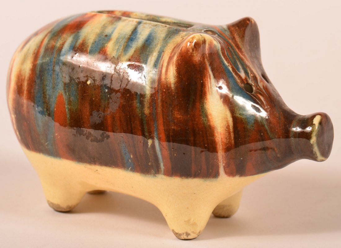 Polychrome Earthenware Pig Still Bank.: Polychrome Mottle Glazed Earthenware Pottery Pig Form Still Bank. 2-3/8"h. x 4"l. Condition: Very good, small pin nip on snout.