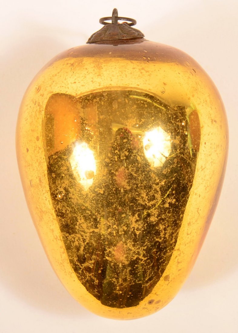 Antique German Kugel.: Antique German Kugel, Gold Blown Glass Egg Form. 3-1/4"h. Condition: Very good.