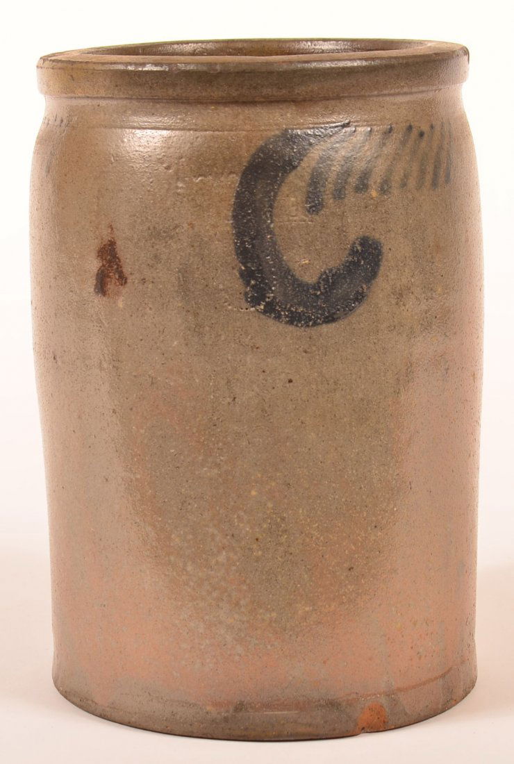 Solomon Bell, Strasburg Redware Storage Crock.: Solomon Bell, Strasburg Salt Glazed Redware Pottery Storage Crock. Molded rim with cobalt blue slip decoration. Faintly stamped upside down near upper rim. 9-3/4"h. Condition: Good, base rim chips.