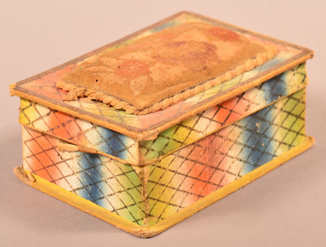 19th Century Wallpaper Covered Sewing Box.: 19th Century Wallpaper Covered Sewing Box. Rectangular form, removable lid with pin cushion, Multi color vertical striped wallpaper with crisscross decoration. 2-1/4"h. x 5"w. x 3-1/2"d. Condition: Go