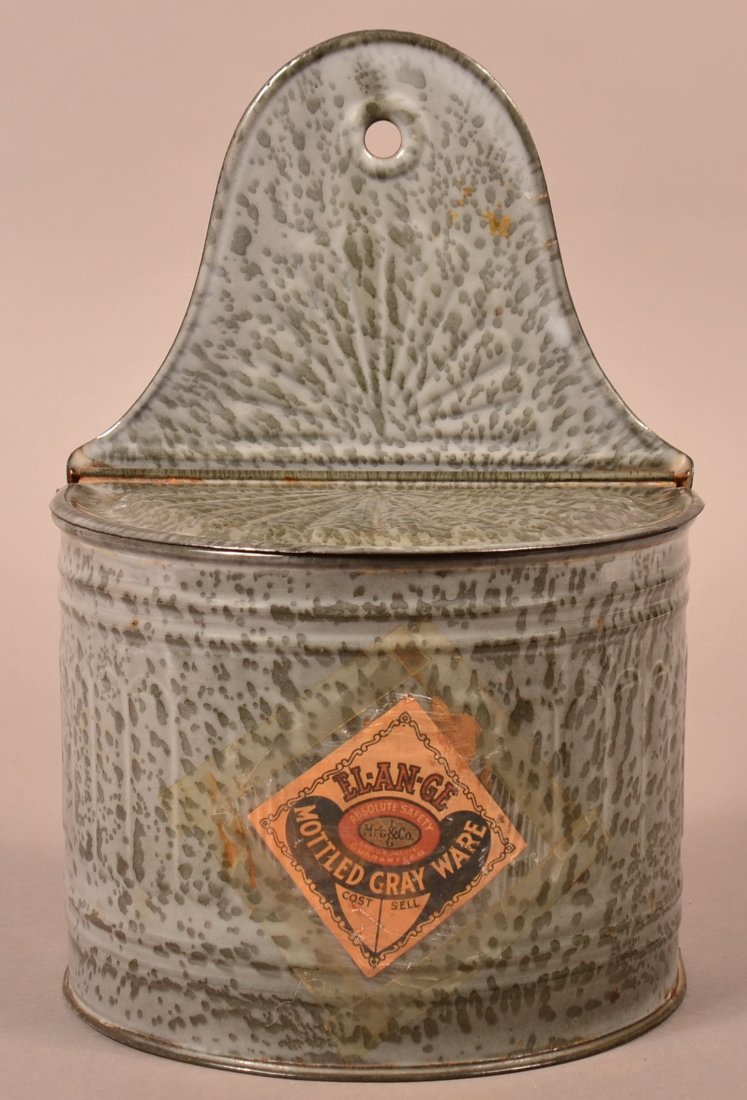 Gray Granite Ware Hanging Salt Box.: Gray Granite Ware Hanging Salt Box. Large mottled, arch back with eyelet, original "EL*AN*GE" (L&G Mfg. Co.) label. 11" h. x 7"w. x 4-3/4"d. Condition: Very good, minor rust at seams.