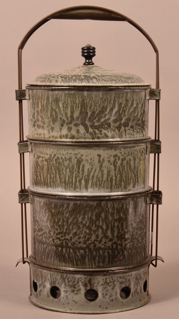 Gray Granite Ware Stacked Dinner Carrier.: Gray Granite Ware Stacked Dinner Carrier. Large mottled, with warming base. 14-1/4"h. overall, 7-1/2' diam. Condition: Good with wear, lid has small holes.