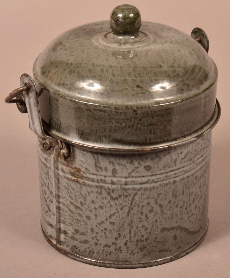 Gray Granite Ware Lunch Pail: Gray Granite Ware Lunch Pail . Medium mottle, wire bail handle with turned wood grip, dome lid, tray insert. Signed L&G Mfg. Co. 7-1/2'h. not including handle. Condition: Good, minor wear and rust.