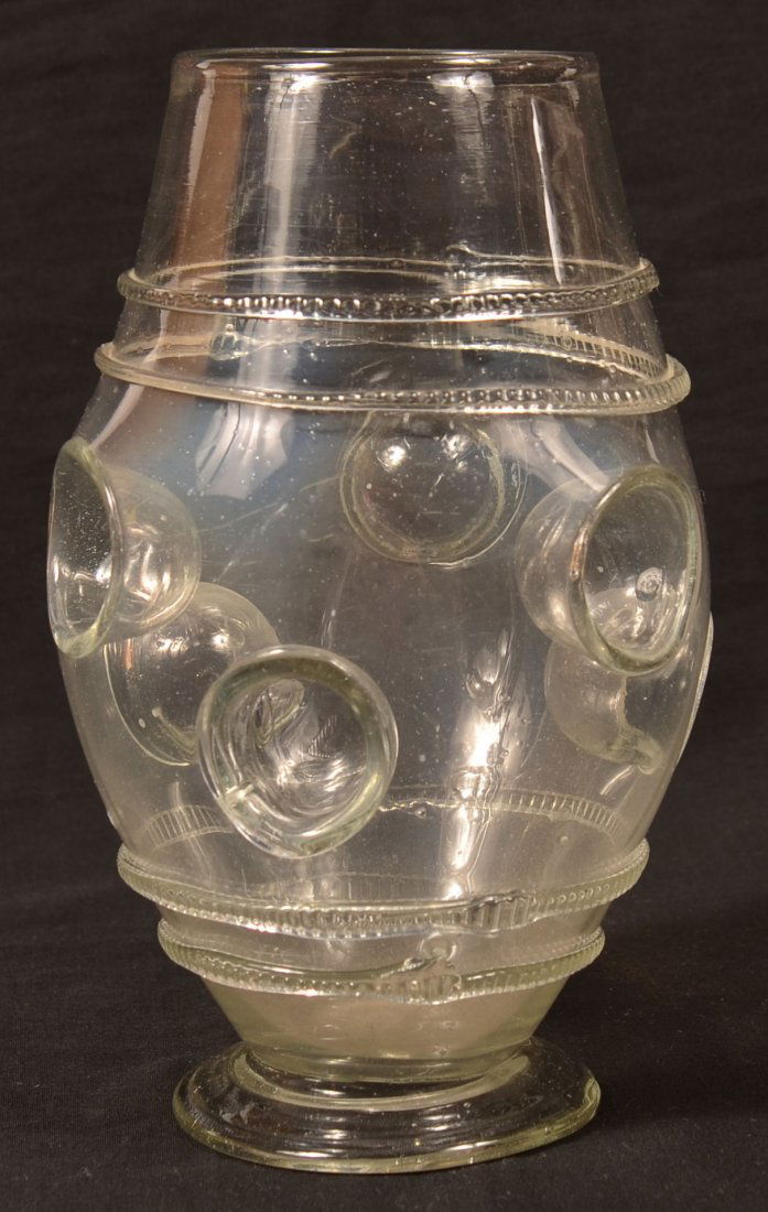 Early Blown Glass Barrel Form Finger Tankard.: Early Blown Colorless Glass Barrel Form Finger Tankard. Applied rings and indented finger grips and footed base. 8"h. Condition: Very good.