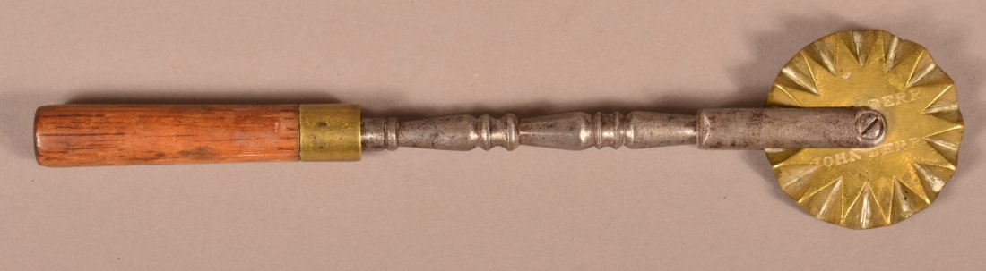 Rare Pie Crimper Signed John Derr.: Rare Brass and Wrought Iron Pie Crimper Signed John Derr. (Oley Valley, Berks County, PA, Circa 1800-1850) Cylindrical wood handle with brass collar, Baluster and ring turned shaft with brass wheel im