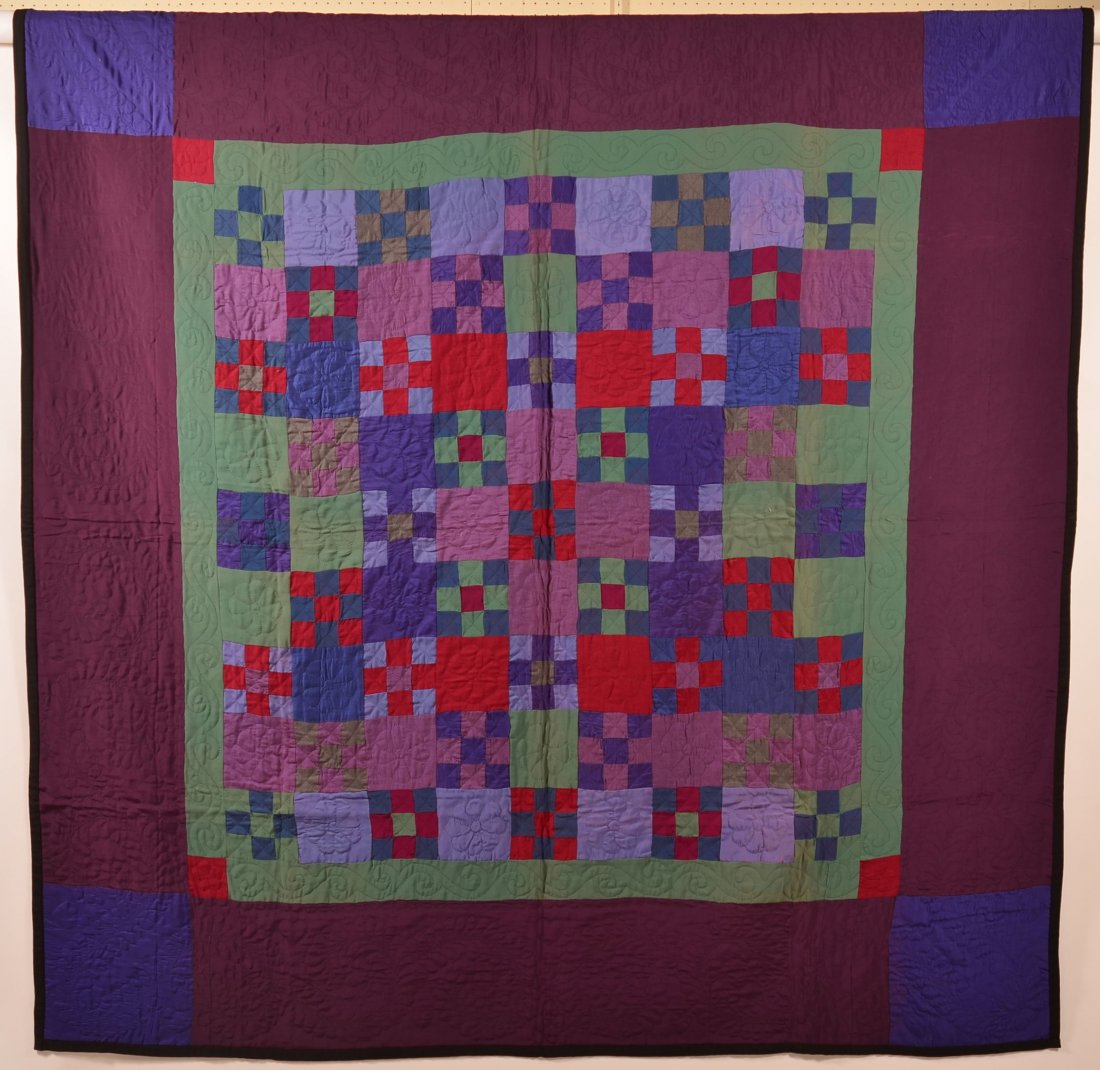 Lancaster County Amish Patchwork Quilt.: Mid 20th Century Lancaster County Amish Patchwork Quilt. Multi color block pattern, rayon fabric. 82" x 85". Condition: Very good with minor staining.