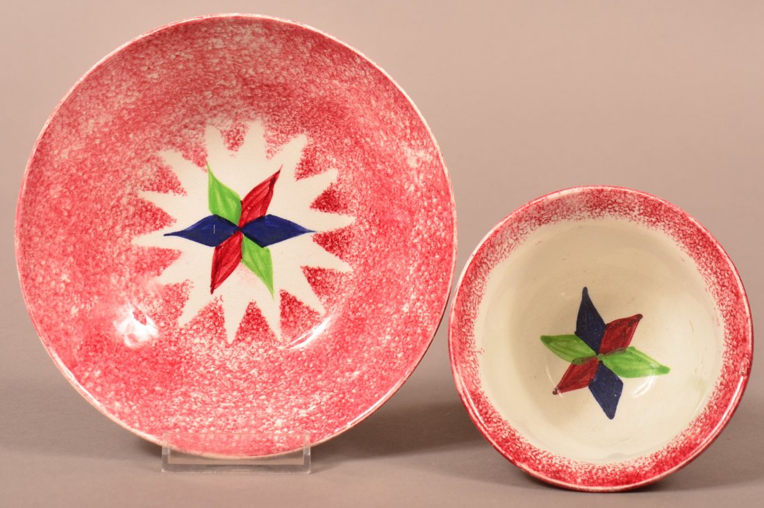 Red Spatter Star Pattern China Cup and Saucer.: Red Spatter Star Pattern China Cup and Saucer. Red, green and blue six pointed star with red sunburst spatter border. Saucer measures 6". Condition: Very good.