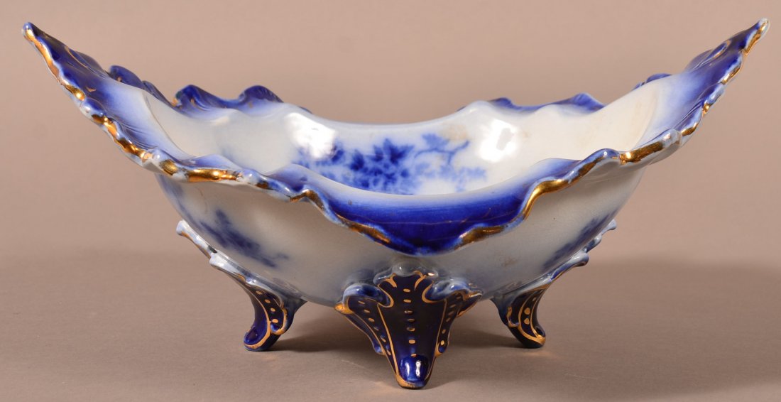 Flow Blue Ironstone Fluted Open Serving Bowl: Flow Blue Ironstone Fluted Open Serving Bowl in Very Unusual Form with Gold Trim . 13"w. x 6"h. Condition: Very good.