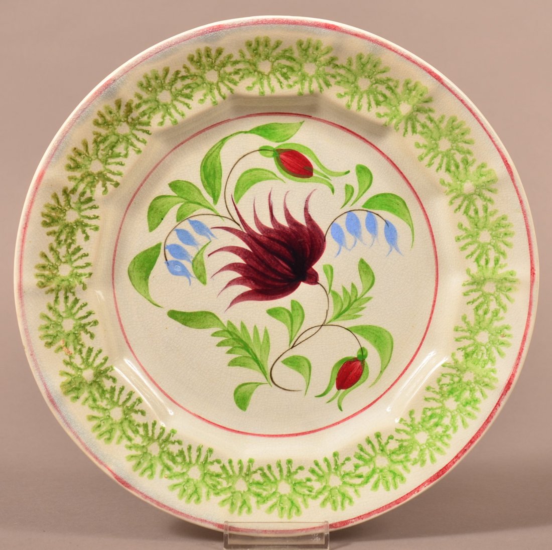 Stick Spatter Ironstone China Plate Columbine: Stick Spatter Plate with Daisy Border and Columbine, Lilly of the Valley, and Rosebud Decoration . 9 3/4". Condition: Very good.