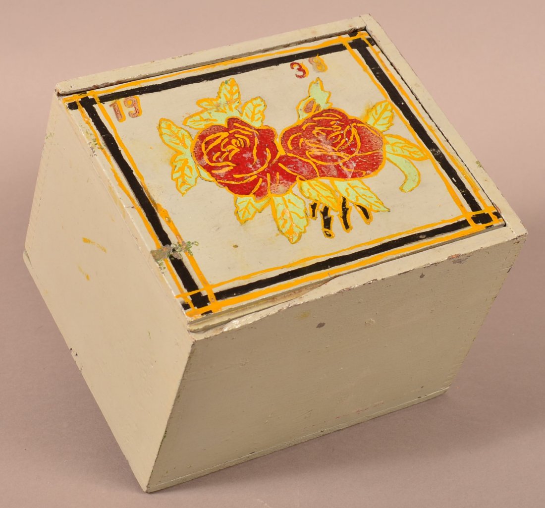 Leah Lapp Decorated Slide Lid Box.: Factory Wood Slide Lid Box. Overpainted, attributed to Leah Lapp, Lancaster Co. Amish decorator, dated 1938, signed under lid in pencil "Fannie B. Beiler from great grandfather Renno". 6-5/8"h. x 9"w.