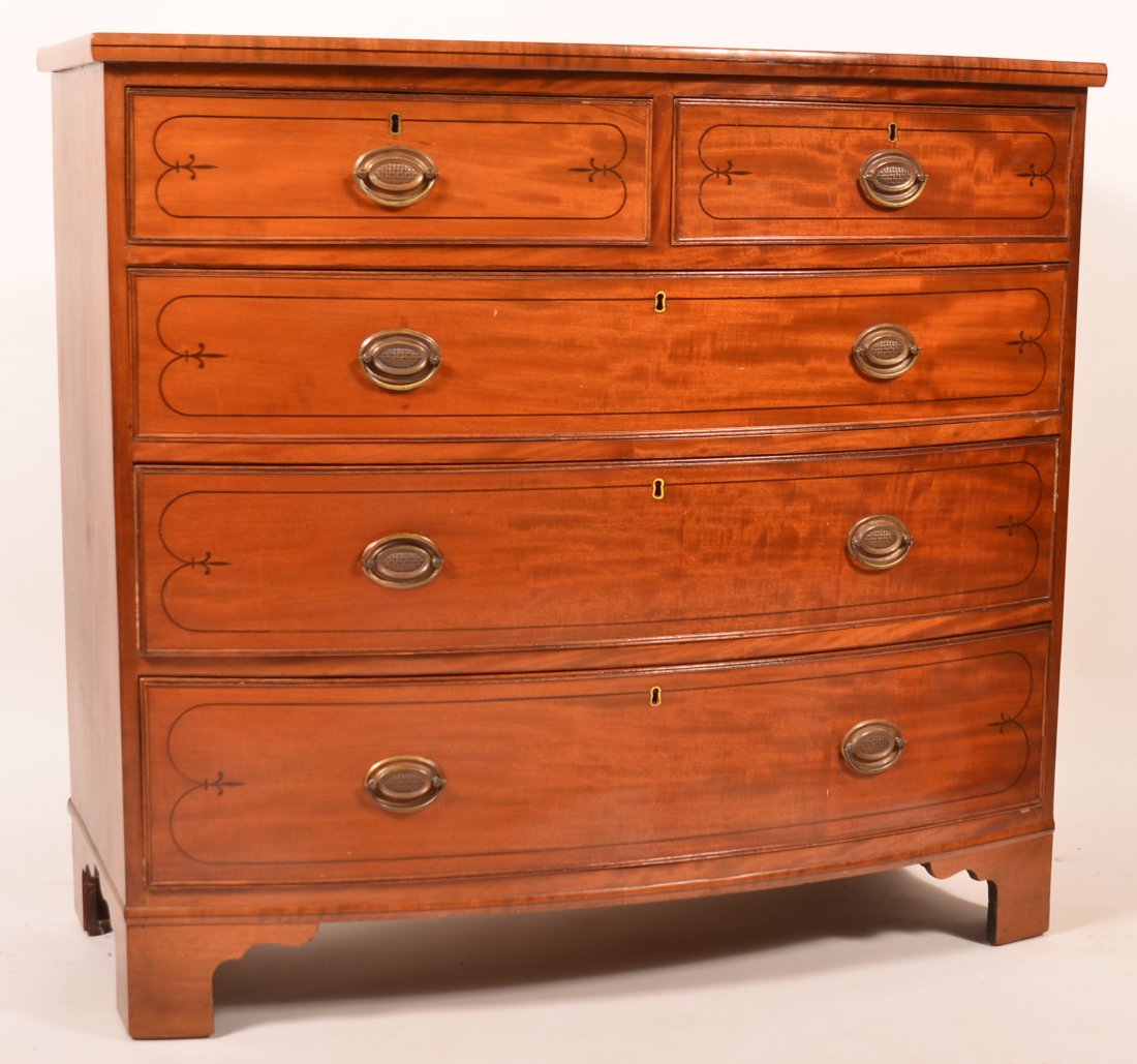 Hepplewhite Mahogany Bow Front Chest.: American Hepplewhite Inlaid Mahogany Bow Front Chest of Drawers. Two split upper and three lower full width cock beaded dovetailed graduated drawers with ebony line and fleur de lis and bracket feet.
