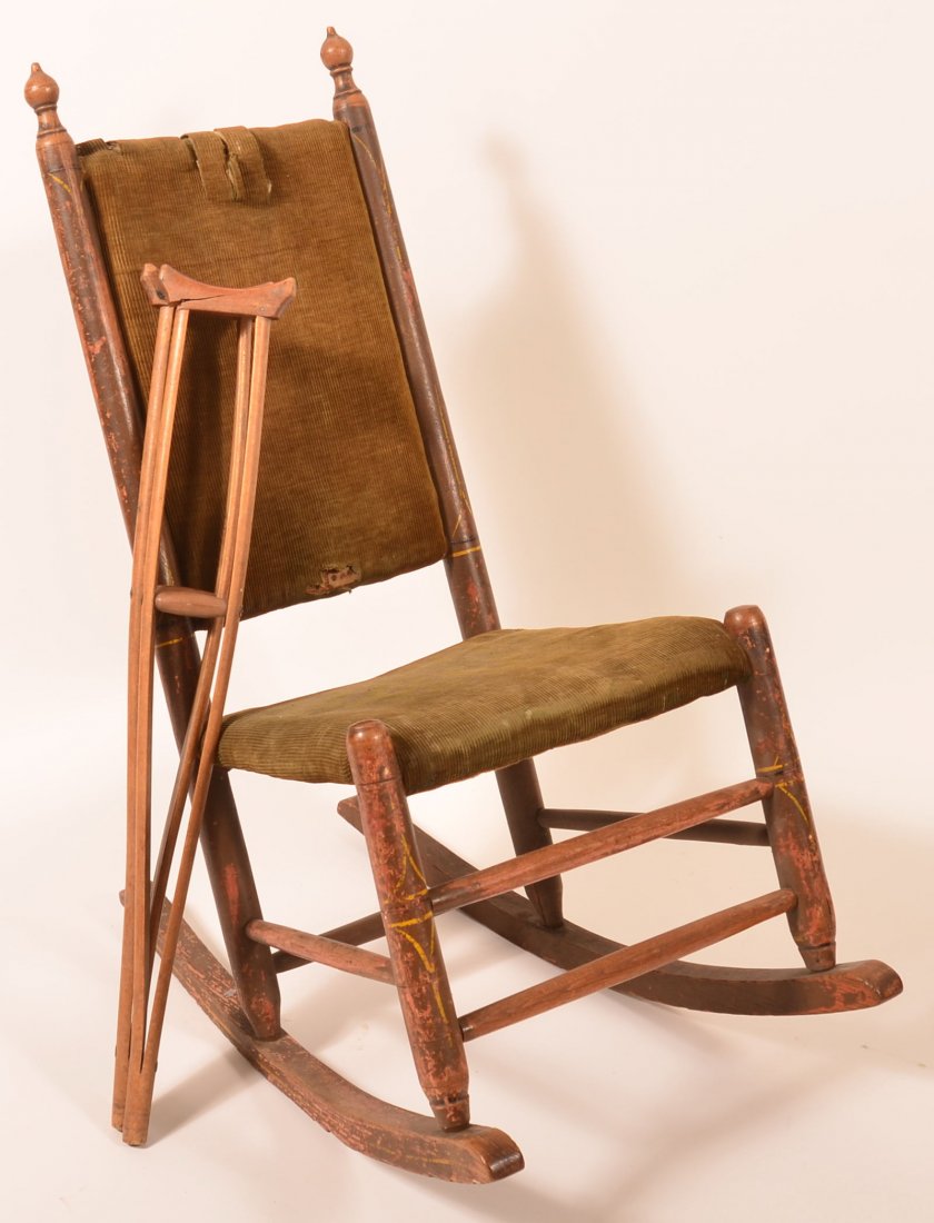 Barbara Ebersol Rocking Chair and Crutches.: Barbara Ebersol Lancaster County, PA Rocking Chair and Crutches. Rocker with velour seat and back, turnip finials, red ground with yellow highlights. Because Barbara was a dwarf she accumulated small 