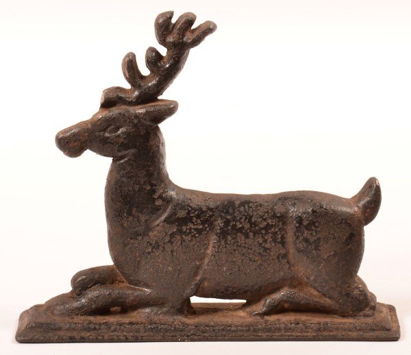 Cast Iron Reclining Stag Doorstop.: Cast Iron Reclining Stag Doorstop. Signed on back S.M. 9-1/4"l. Condition: Fair with overall pitting and paint wear.