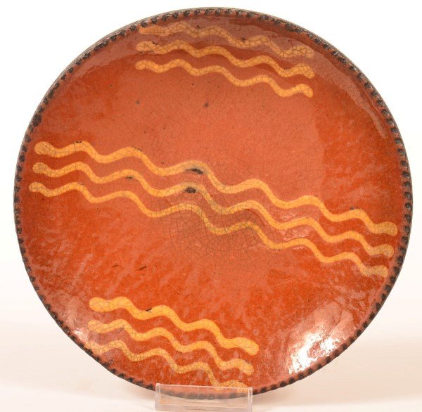 Yellow Slip Decorated Redware Pottery Plate. (1 of 2)