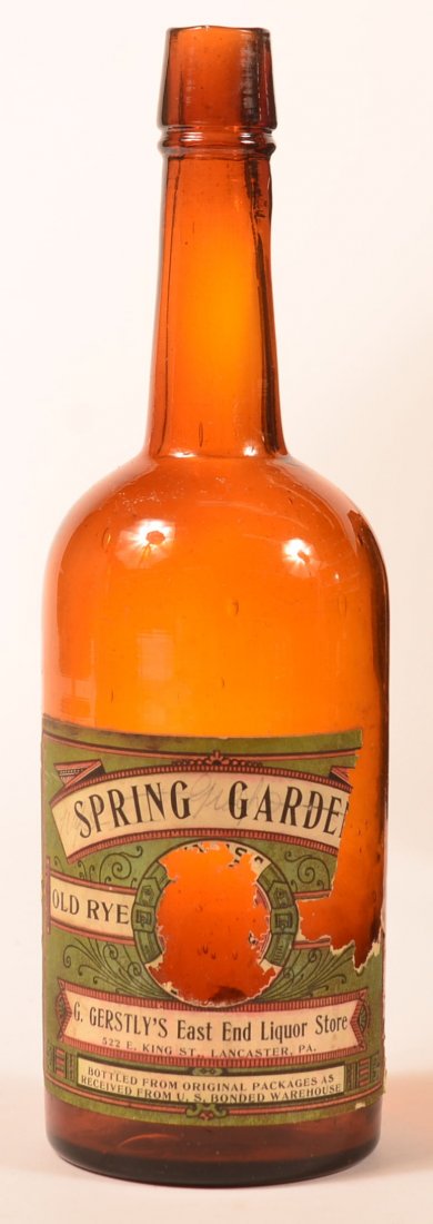 G. Gerstly's Whiskey Bottle, Lancaster, PA.: G. Gerstly's East End Liquor Store, 522 East King Street, Lancaster, PA, Spring Garden Old Rye Paper Label, Amber Bottle, 11 1/2" tall. Condition: Good, with Loss on Label.