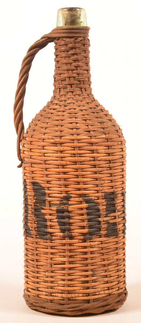 Painted "Rohrer" Wicker Covered  Aqua Bottle. (1 of 3)