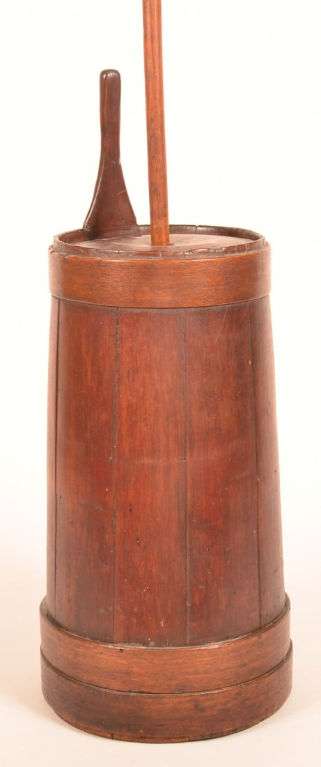 19th Century Shaker Mixed Wood Butter Churn.: 19th Century Shaker Mixed Wood Butter Churn. Natural varnished finish, vertical staves with interlocking tapered support bands with elongated handle and plunger. 52-3/4"h. overall. Condition: Good wit