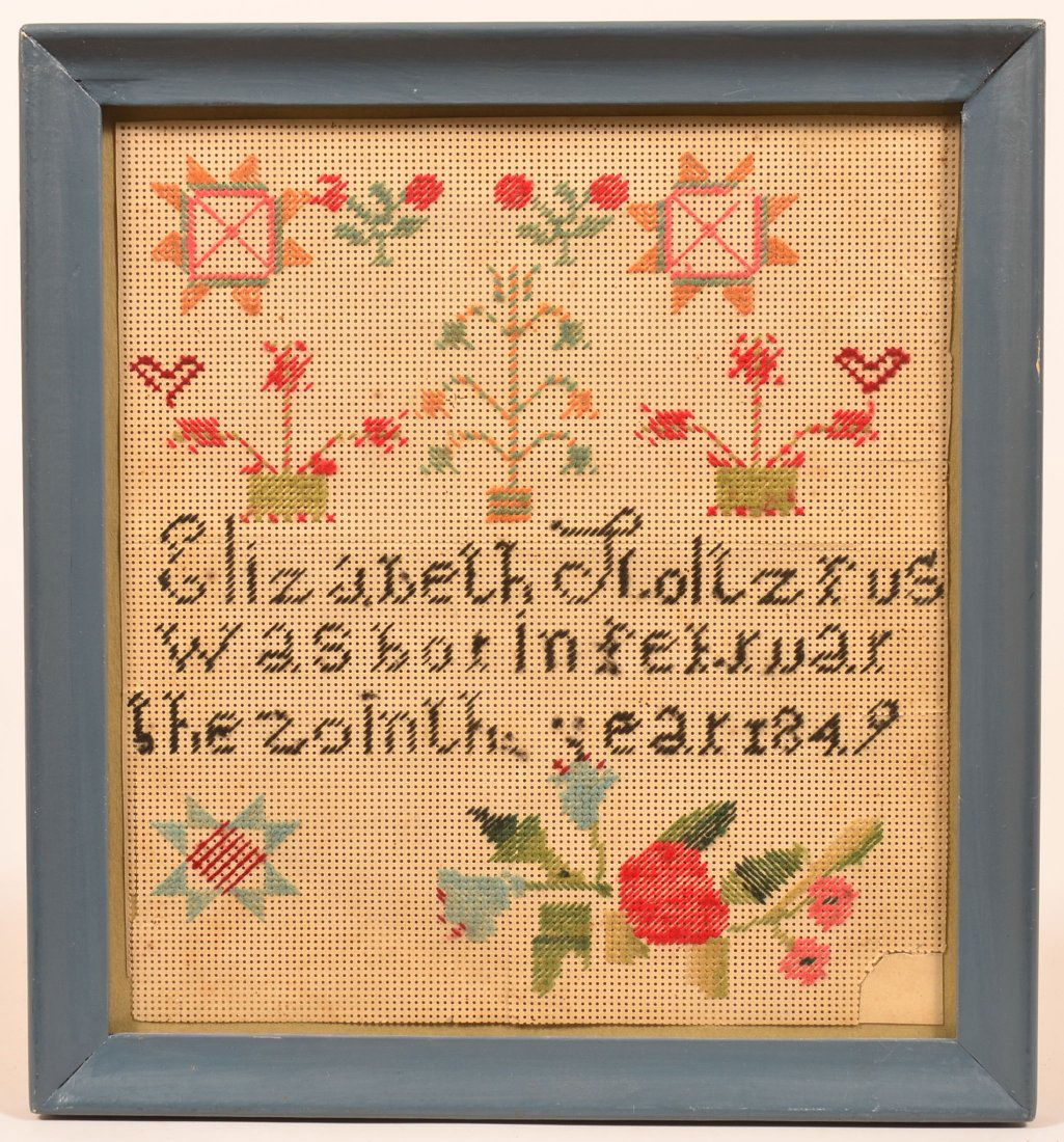 Amish Wool Yarn Birth Record.: Amish Wool Yarn on Punched Cardboard Birth Record. Signed "Elizabeth Stoltzfus was born in February the 20th in the year 1849". Floral, foliate, heart and geometric motifs, in a molded frame. 10-1/2"h