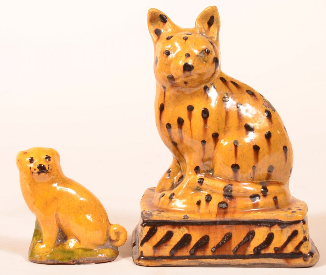 Two Shooner Redware Pottery Animal Figures. (1 of 1)