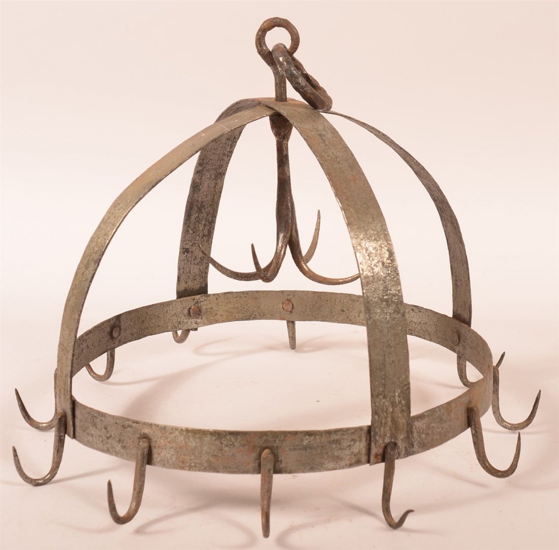 19th Century Iron Crown Meat Holder: 19th Century Iron Crown Meat Holder with Center Hook. 14"h x 15"diam. Condition: Good with normal wear.