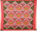 Antique Basket in Diamond Patchwork Quilt.