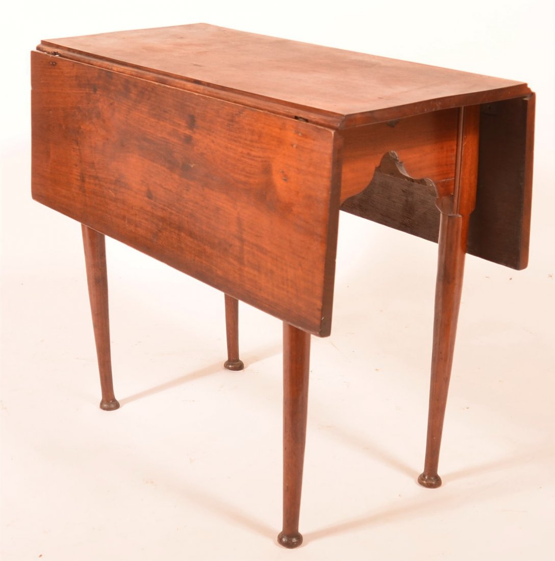 18th Century NE Pad Foot Drop Leaf Table: 18th Century NE Pad Foot Drop Leaf Table. Opened 29"h x 39"w x 36 1/4"d. Condition: Good with minor losses.