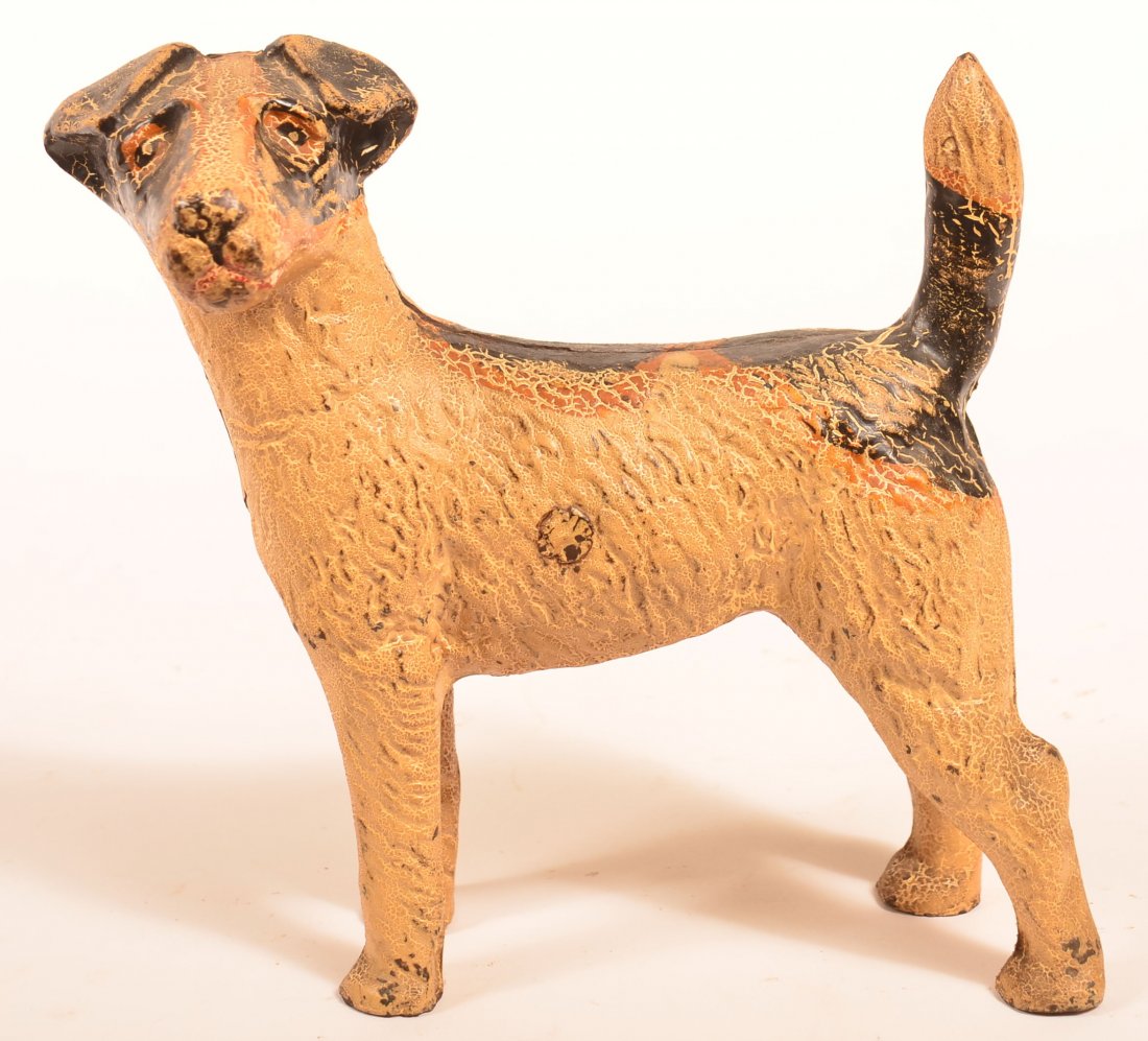 Cast Iron Wired Hair Terrier Doorstop.: Cast Iron Wired Hair Terrier Doorstop. 9-3/4"h. Condition: Good with crackqular surface.