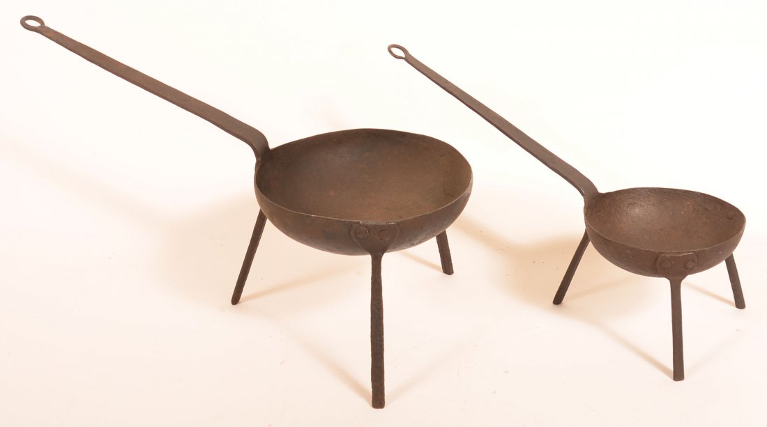 Two Wrought Iron Kettles on Tripod Bases. (1 of 1)
