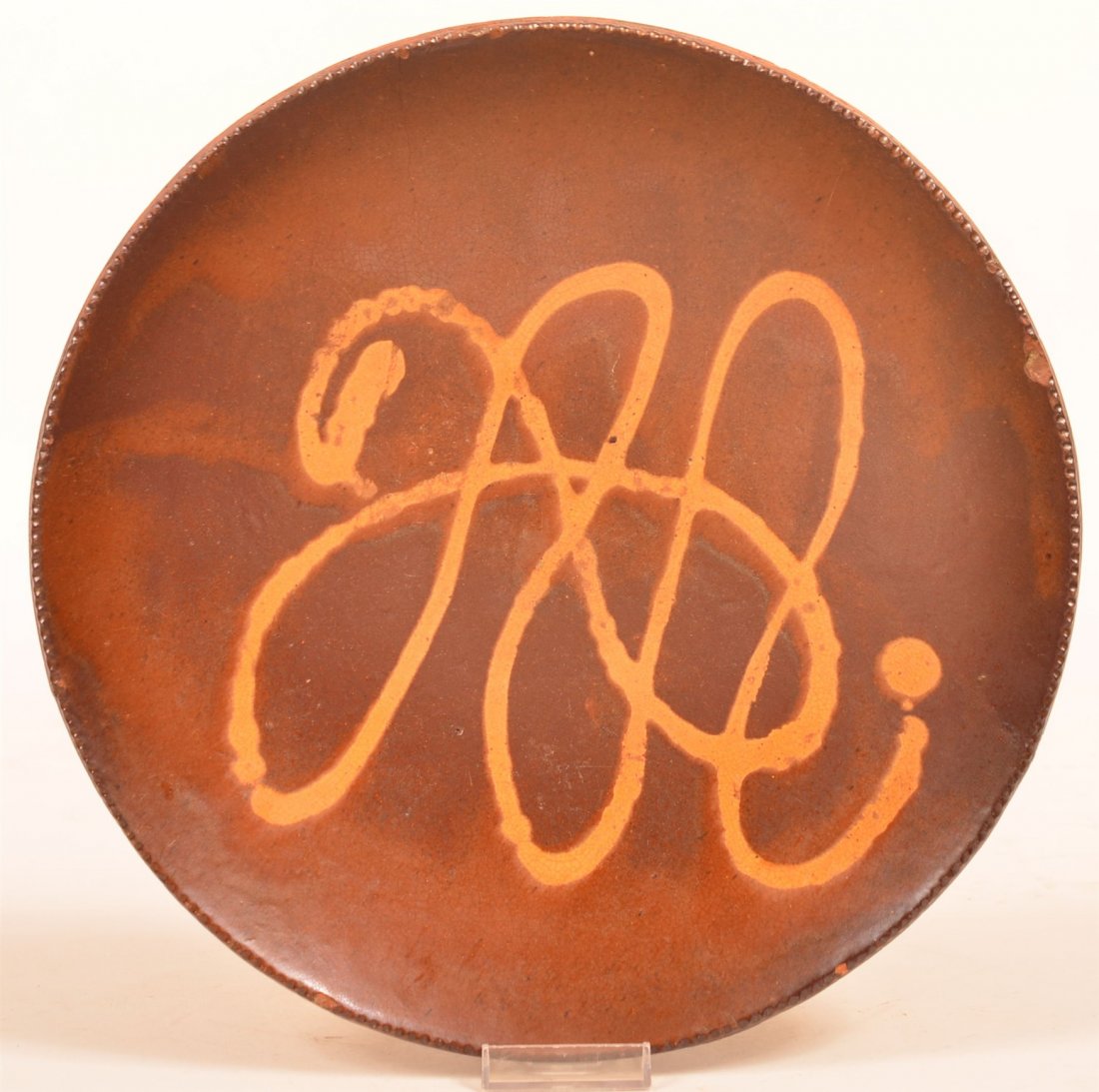 Yellow Slip Decorated Redware Charger. (1 of 2)