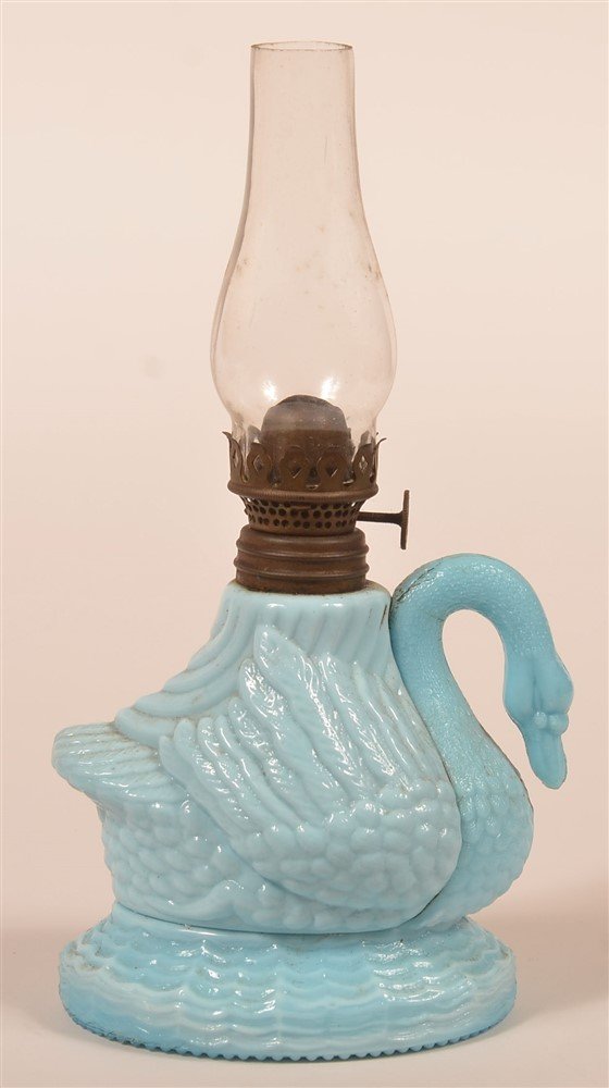 Blue Milk Glass Swan Miniature Fluid Lamp. (1 of 2)