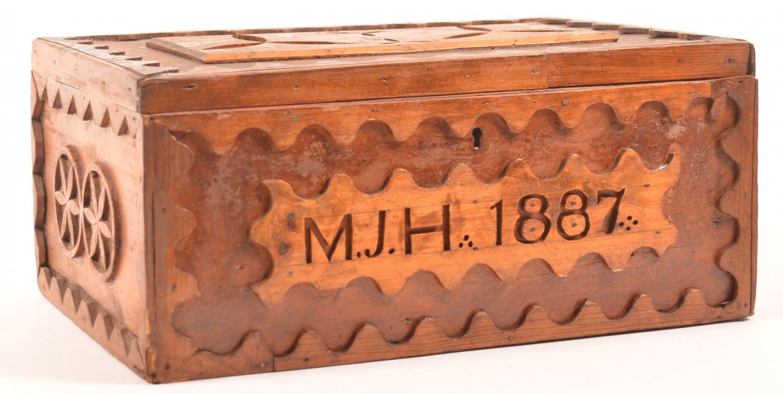 Folk Art Softwood Lock Box "M.J.H. 1887".: Folk Art Softwood Lock Box "M.J.H. 1887" on Front Panel. Scalloped border with raised pin-wheel design. 7-1/2"h. x 16"w. x 11"d. Condition: Good with minor wear, repair and losses.