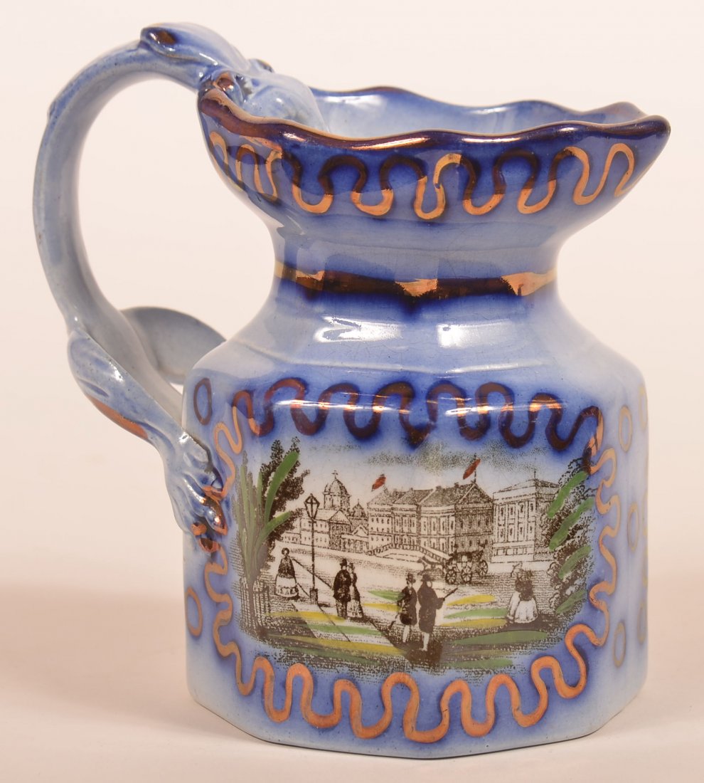 Transfer Dec. Ironstone China Cream Pitcher.: Flow Blue Lustre and Transfer Decorated Ironstone China Cream Pitcher. Transfer scenes "Princess Royal and Prince of Prussia" on obverse, and street and architectural building scene on reverse. (Princ