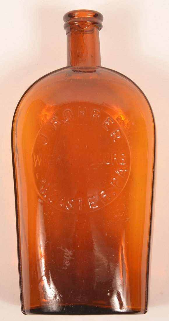 J. Rohrer Lancaster, PA Amber Glass Flask. (1 of 3)